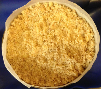 Paleo plumb crumble on top before baking